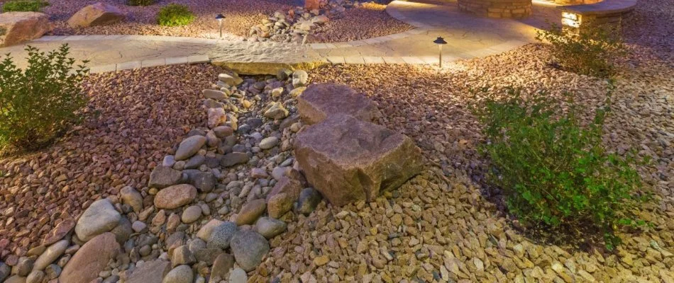 Landscaping in McKinney, TX, with rocks and plants.