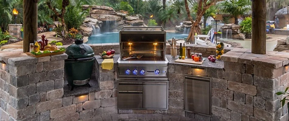 Outdoor kitchen in McKinney, TX, with a grill.