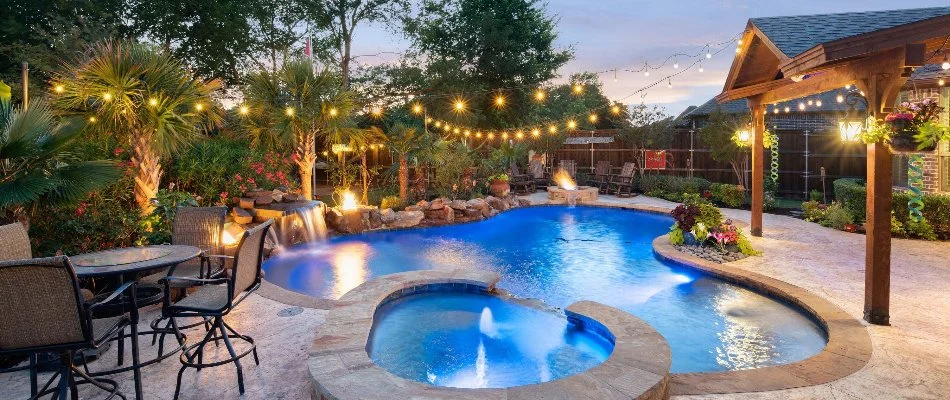 Outdoor living space with a pool in Arlington, TX.