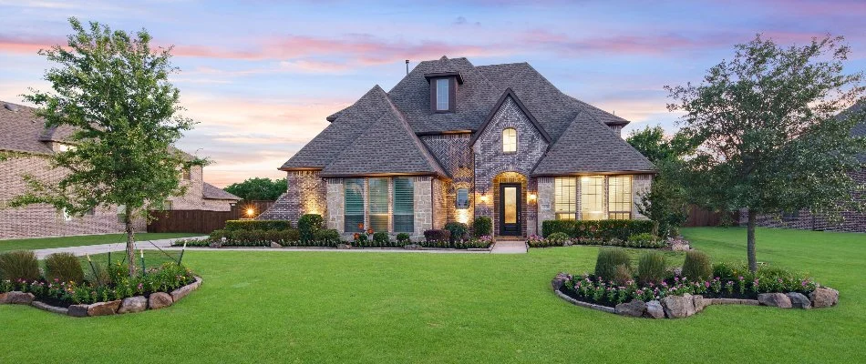 Home with healthy grass in McKinney, TX.