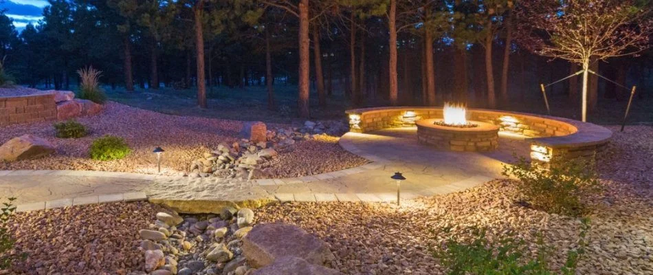 Walkway, fire pit, and a seating wall in Frisco, TX.