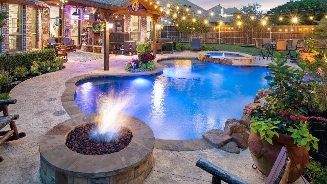 Home in McKinney, TX with pool and fire pit in backyard.