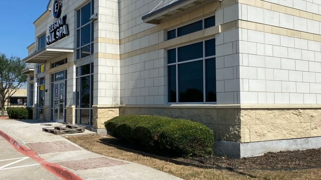 Trimmed shrubs in front of a commercial business in Prosper, TX.